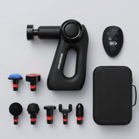 Pistolet de massage - Flatlay complet avec télécommande, 7 têtes et étui de transport